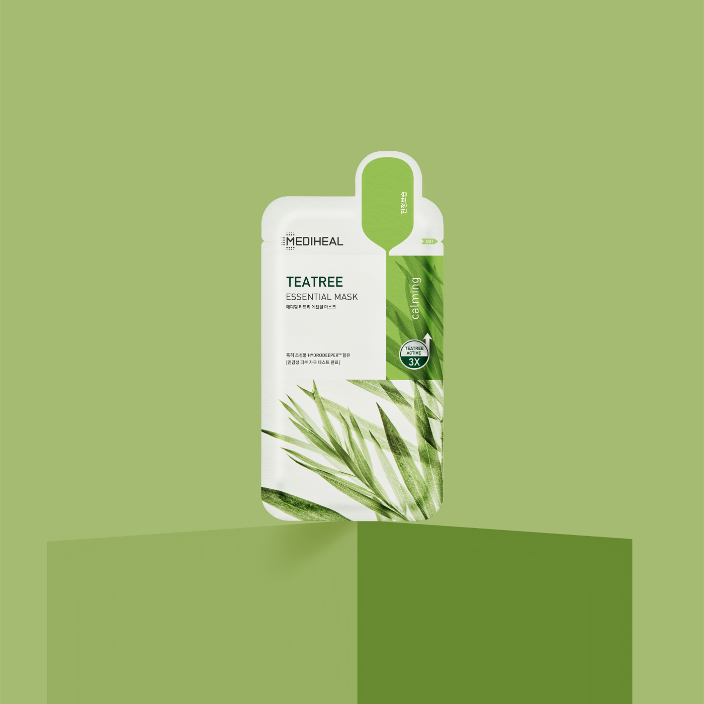 mediheal Teatree Essential Mask 24 ml  en mask framför grön bakgrund